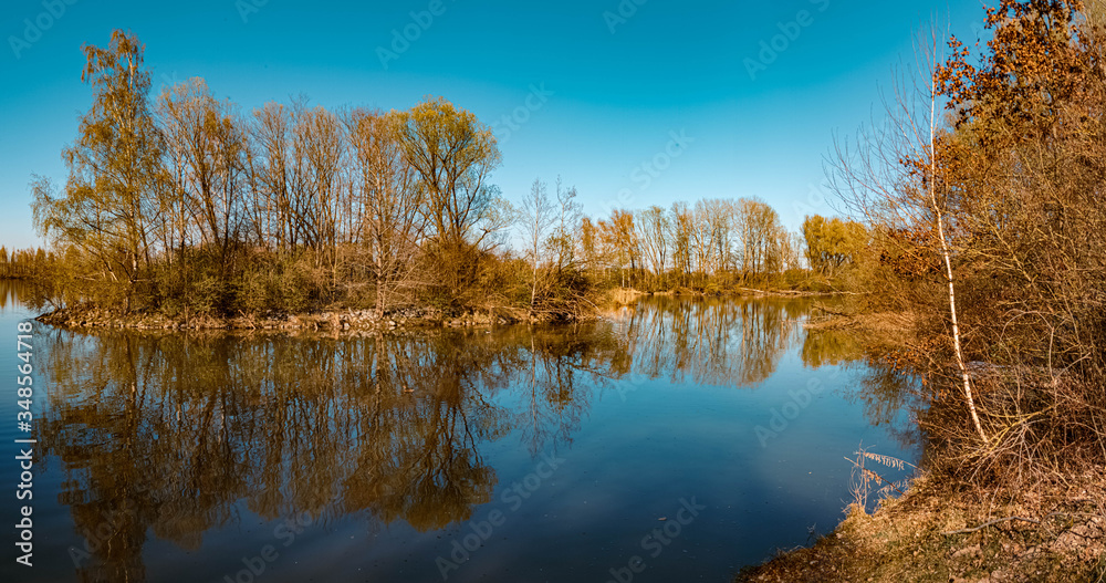 High resolution stitched panorama of a beautiful spring view with reflections near Mamming, Isar, Bavaria, Germany