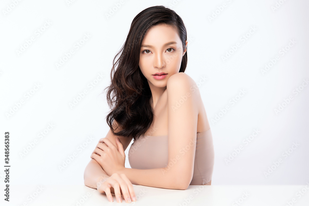 Beautiful Young Asian Woman with Clean Fresh Skin. Face care, Facial treatment, Cosmetology, beauty and healthy skin and cosmetic concept, woman beauty skin isolated on white background Beautiful Young Asian Woman with Clean Fresh Skin. Face care, Facial treatment, Cosmetology, beauty and healthy skin and cosmetic concept, woman beauty skin isolated on white background