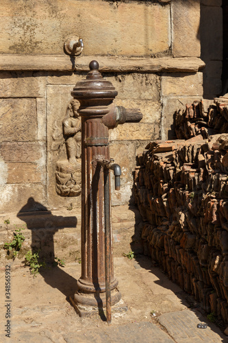 Old vintage Standpipe on the street. Kirtipur. Nepal photo