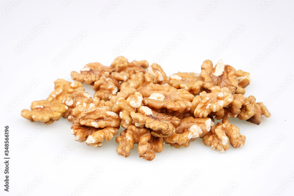 Organic Tasty walnuts isolated on white background Organic Tasty walnuts isolated on white background