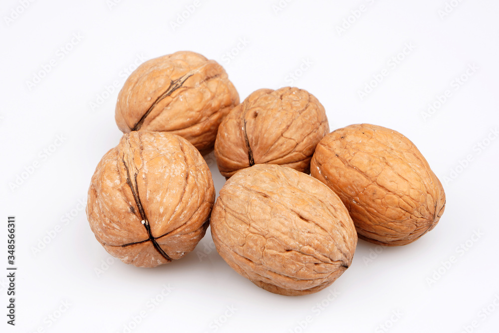 Some Organic walnut on white background. Top view Some Organic walnut on white background. Top view