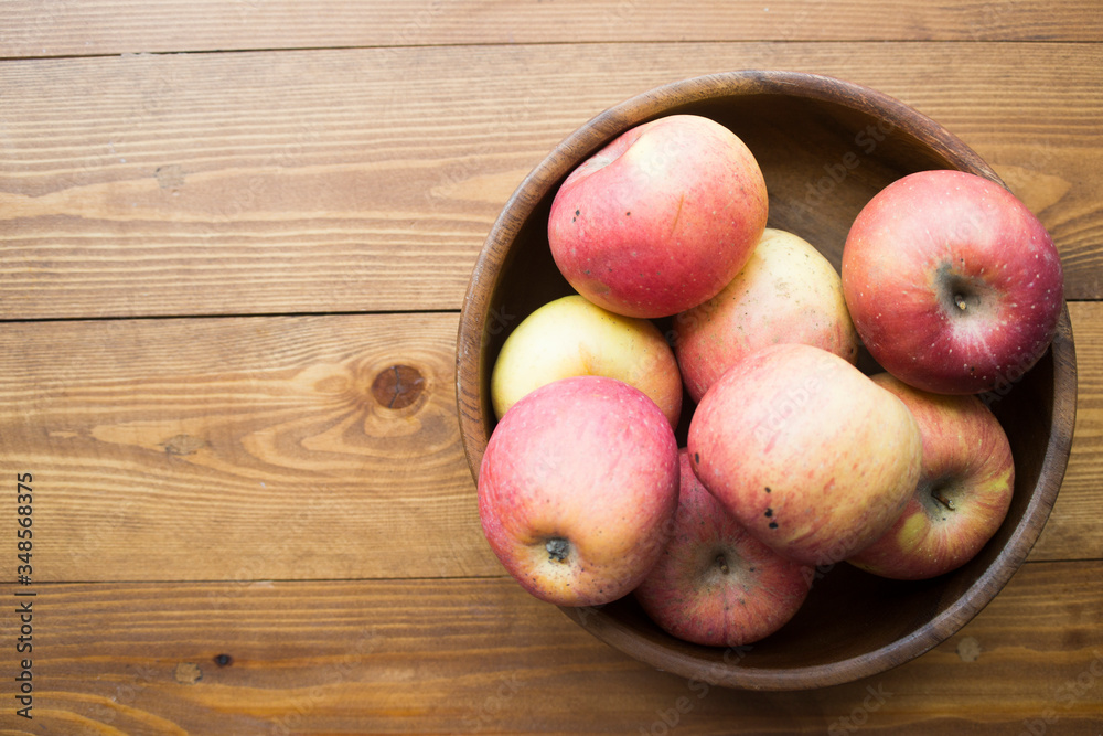 ripe apple on a wooden background ripe apple on a wooden background