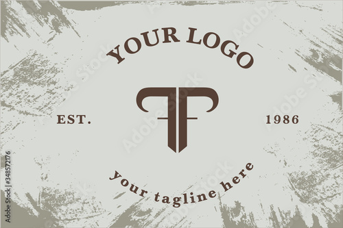 Logotype lettering T and F. Shield in the form of the bull