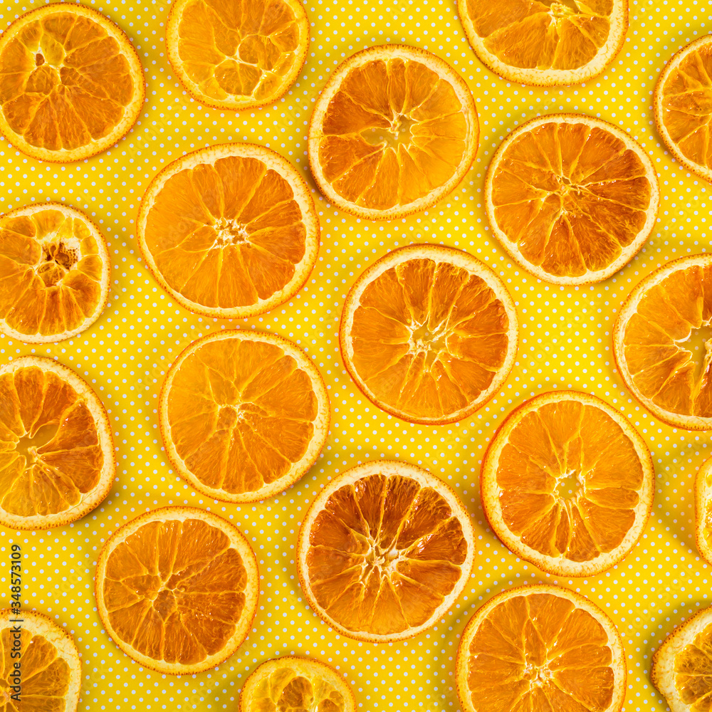 Fototapeta premium Dry Oranges Slices Snack Background. Selective focus.
