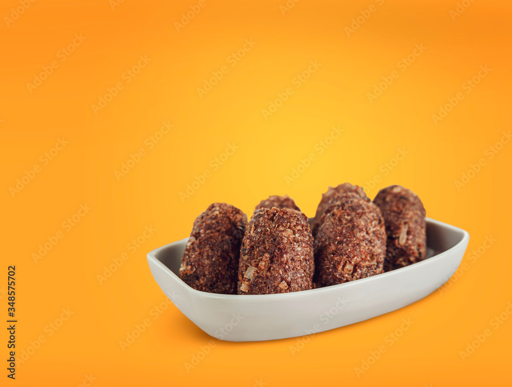 Brazilian appetiser kibbeh (Middle Eastern minced meat and bulghur fried snack)