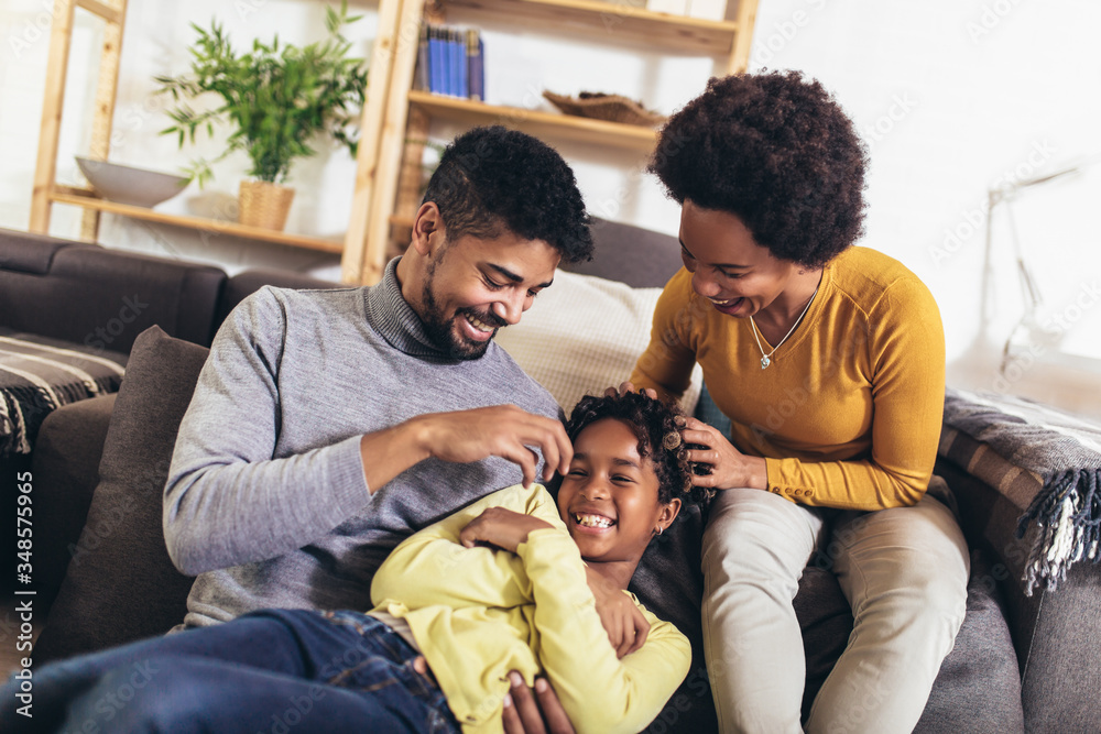 Happy african american family having fun at home. Happy african american family having fun at home.