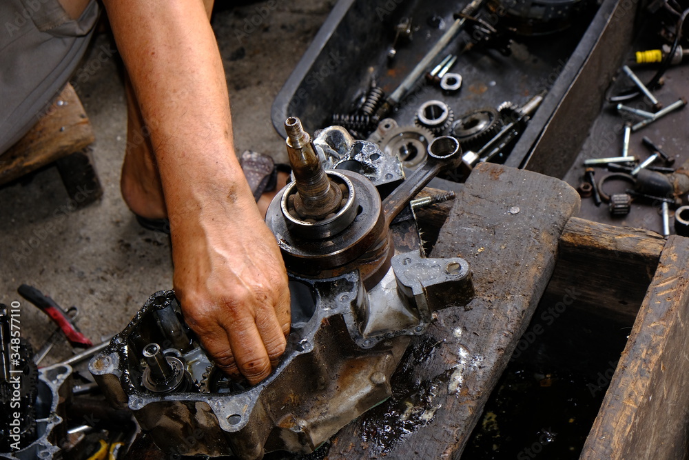 Motorcycle engine mechanic Dismantling engine parts Motorcycle engine mechanic Dismantling engine parts