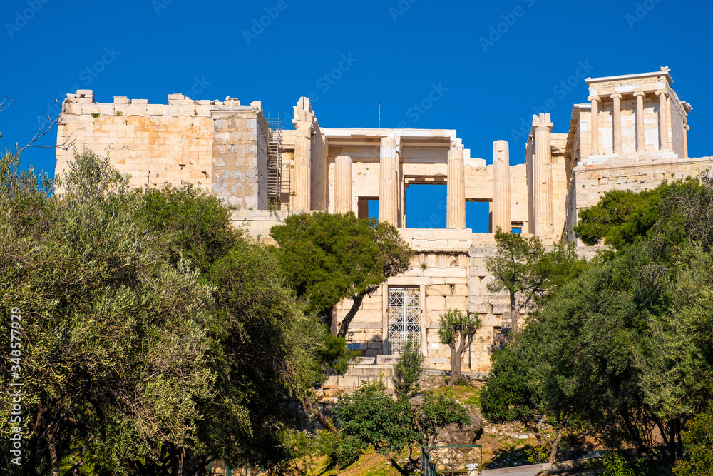 Panoramic view of Acropolis of Athens with Propylaea monumental gateway and Nike Athena temple in ancient city center in Athens, Greece