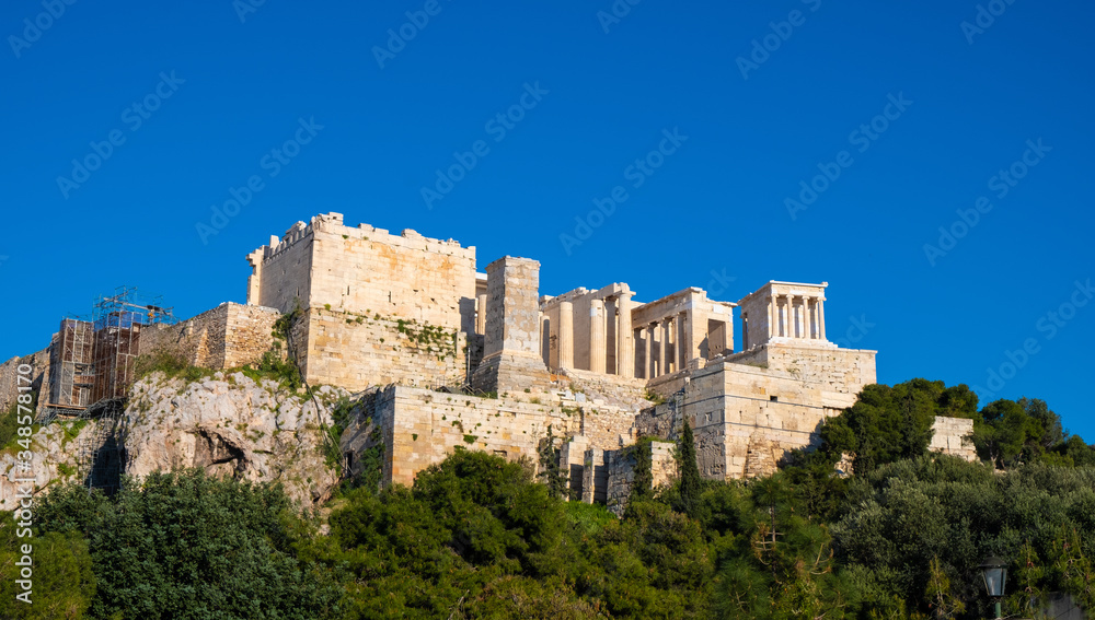 Panoramic view of Acropolis of Athens with Propylaea monumental gateway and Nike Athena temple seen from Aeropagus rock in Athens, Greece