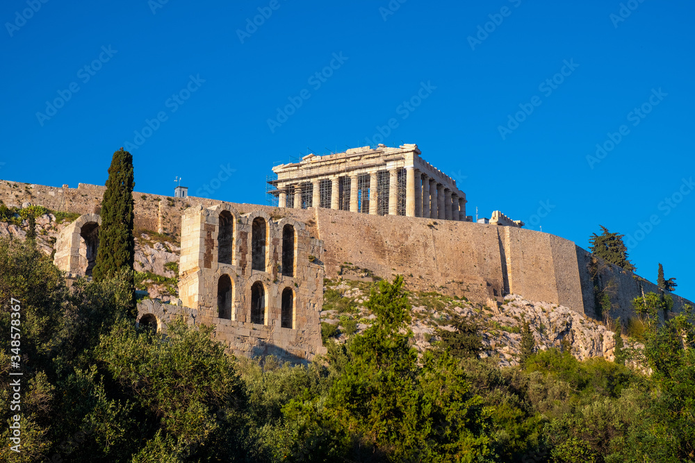 Panoramic view of Acropolis of Athens with Parthenon Athena temple and Odeon of Pericles amphitheater in Athens, Greece