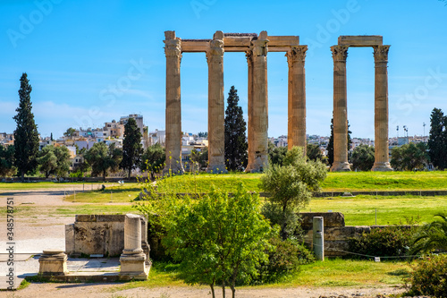 Fototapeta Naklejka Na Ścianę i Meble -  Panoramic view of Temple of Olympian Zeus, known as Olympieion at Leof Andrea Siggrou street in ancient city center old town borough in Athens, Greece