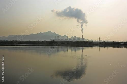 Power Plant with wetland or reservoir.