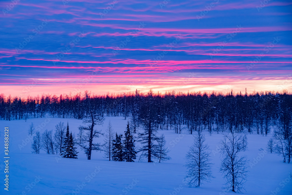Winter sunset in the Ural mountains. Winter ski trip