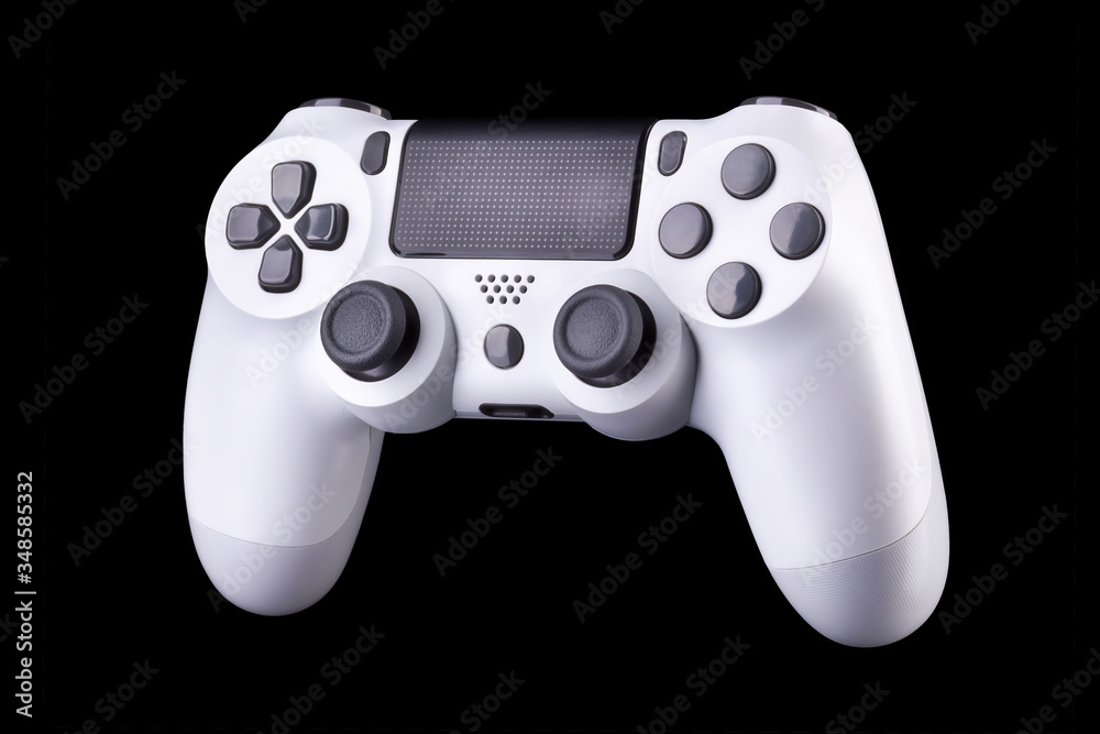 White video game joystick gamepad isolated on a black background White video game joystick gamepad isolated on a black background