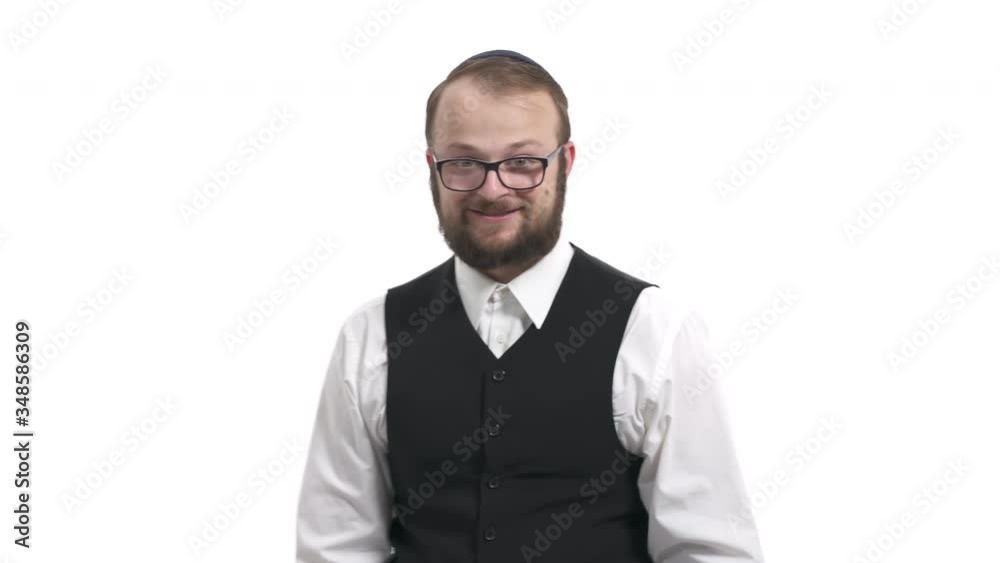 Front view of a young handsome man suddenly appearing into camera view and expressing happiness (isolated on white). True emotions. Body language concept Front view of a young handsome man suddenly appearing into camera view and expressing happiness (isolated on white). True emotions. Body language concept