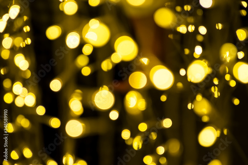 Golden Lighting and decoration item for Christmas and New Year Celebration; Blurry Abstract concept
