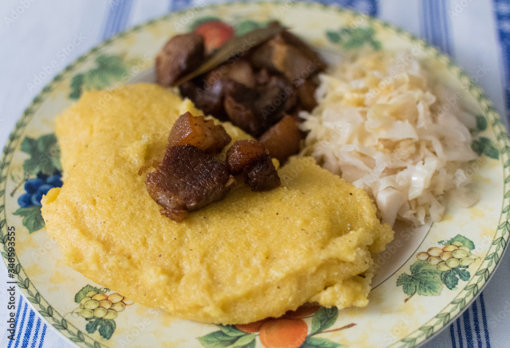 Delicious unhealthy fried pork greaves in the pan traditional Romanian Christmas dish. Jumari