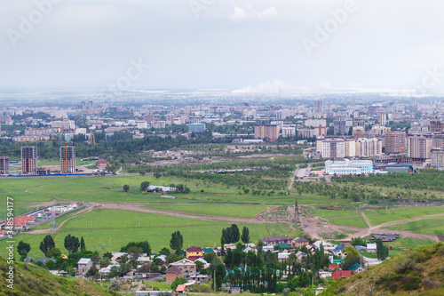Fototapeta Naklejka Na Ścianę i Meble -  View of the city from the mountain. Summer landscape. Kyrgyzstan, Bishkek