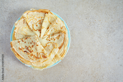 fresh crepes on stone background photo