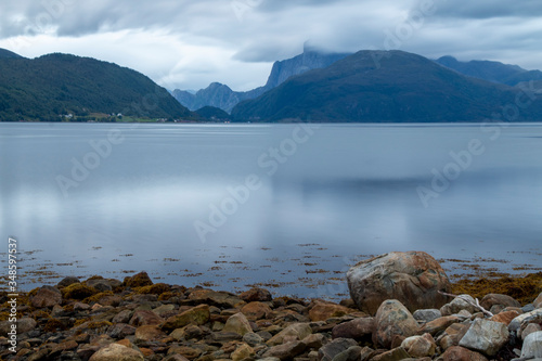 Wonderful view of a fjord in Norway with the mountains in the background in summer