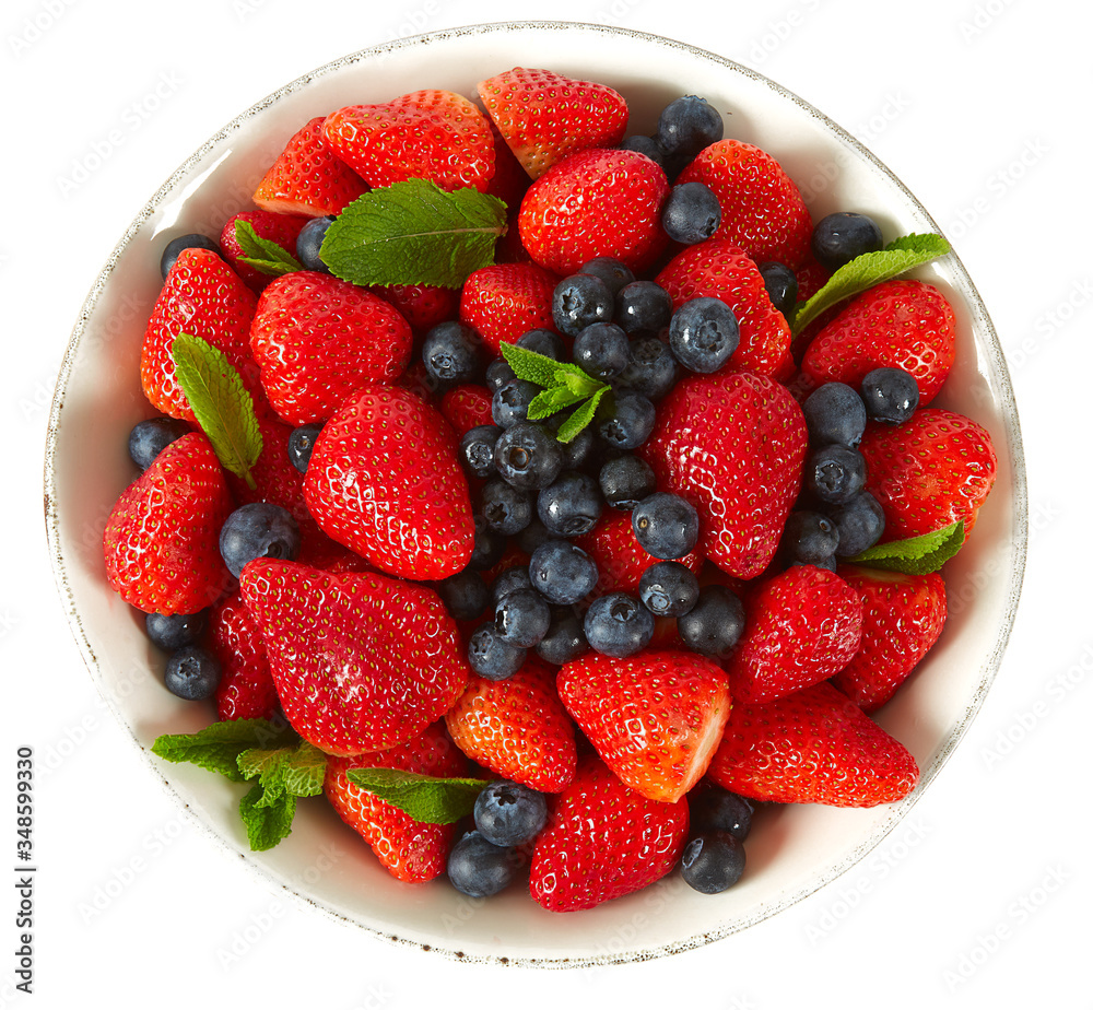 Obraz premium strawberries with mint leafs on granite surface