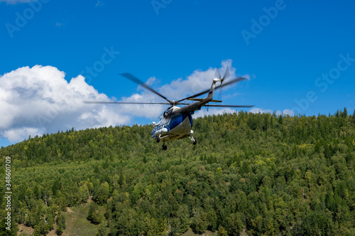 takeoff and landing helicopter in the mountains