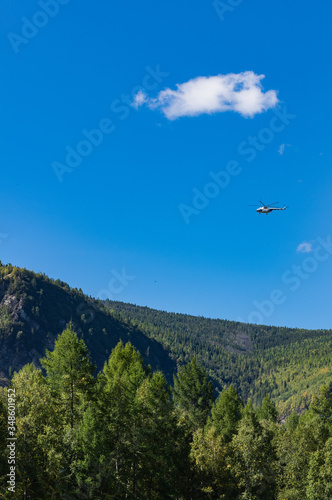 takeoff and landing helicopter in the mountains