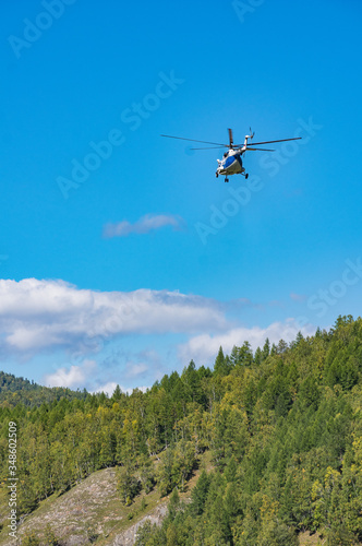 takeoff and landing helicopter in the mountains