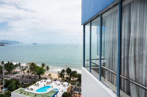 Glass windows transparent on hotel with tropical sea