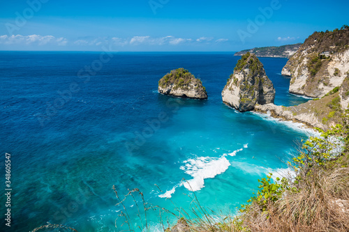 Tropical Diamond beach with blue ocean and cliff in Nusa Penida
