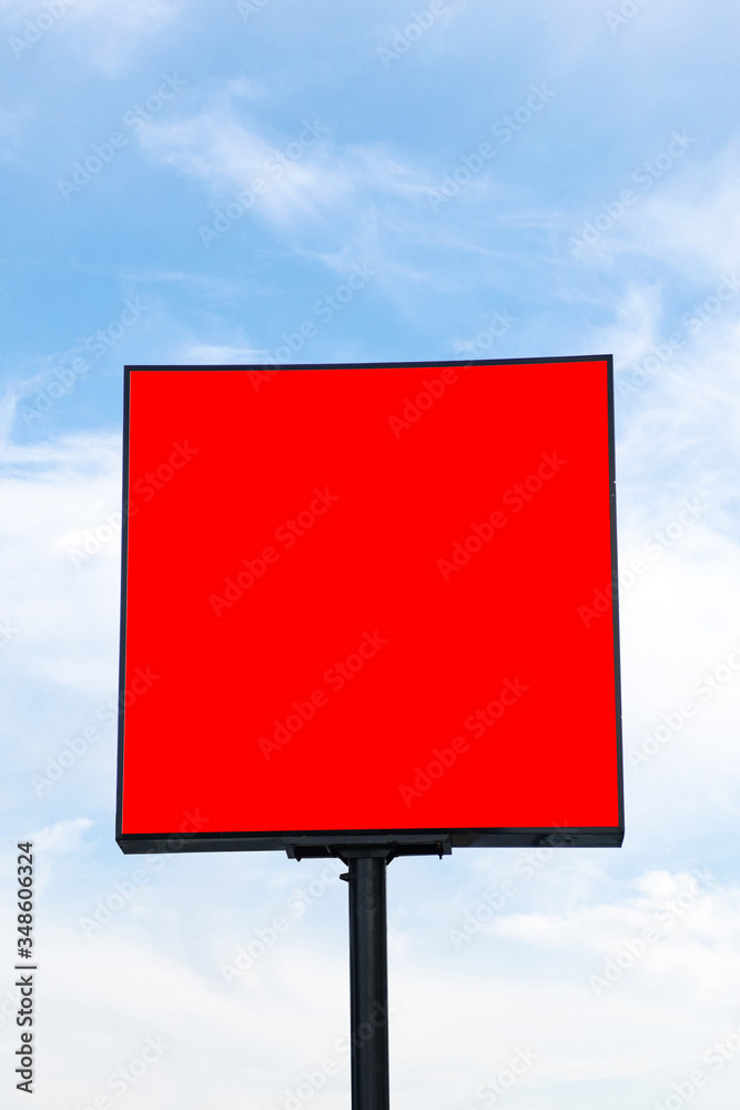 Square billboard with beautiful dusk clouds in the background. The nameplate is towering with a very high pole. blank billboard, signboard mockup. The signboard shows an identity of the shop. Square billboard with beautiful dusk clouds in the background. The nameplate is towering with a very high pole. blank billboard, signboard mockup. The signboard shows an identity of the shop.