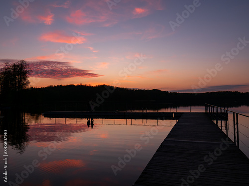 Fototapeta Naklejka Na Ścianę i Meble -  Amazing sunset, with beautiful sky reflections in the water of Hancza lake. Suwalski landscape park, Podlaskie, Poland