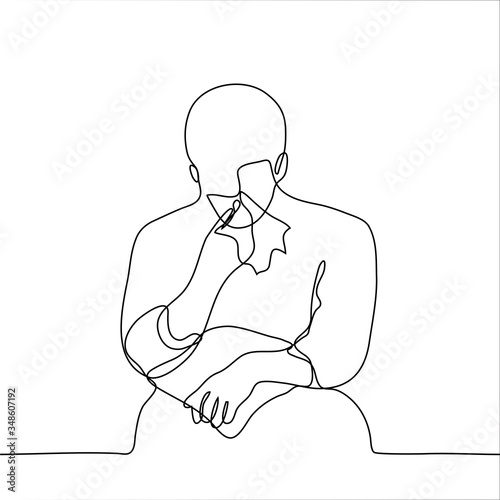 the man is sitting and crying. one continuous line drawing of a seated man wiping his tears with a handkerchief, on his lap a pillow. Vector illustration of a sad man can be used for animation.