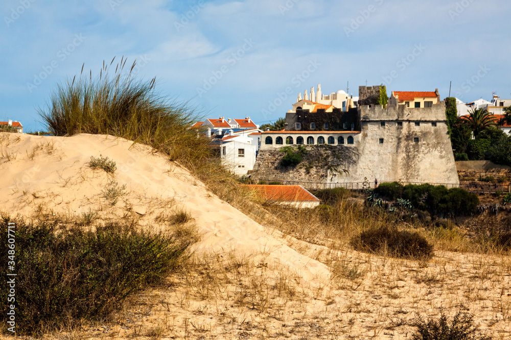 Fishermen's route in the Alentejo, promenade with cliffs in Portugal. Wooden walkway along the coastline. Fishermen's route in the Alentejo, promenade with cliffs in Portugal. Wooden walkway along the coastline.