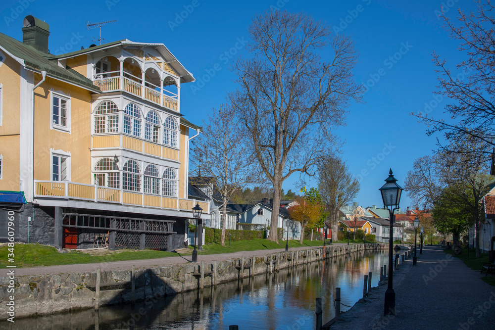 Old town in the district Trosa with its narrow canal and classic old houses south of Stockholm Old town in the district Trosa with its narrow canal and classic old houses south of Stockholm