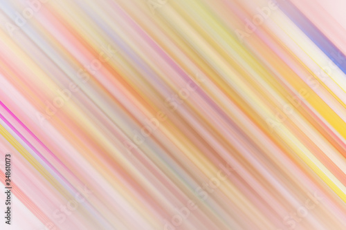 blurred abstract rainbow texture background in pastel colors with diagonal stripes