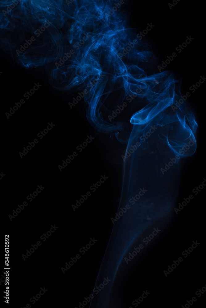 The movement of the smoke on a black background . The movement of the smoke on a black background .