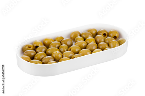 Bowl with canned green olives
