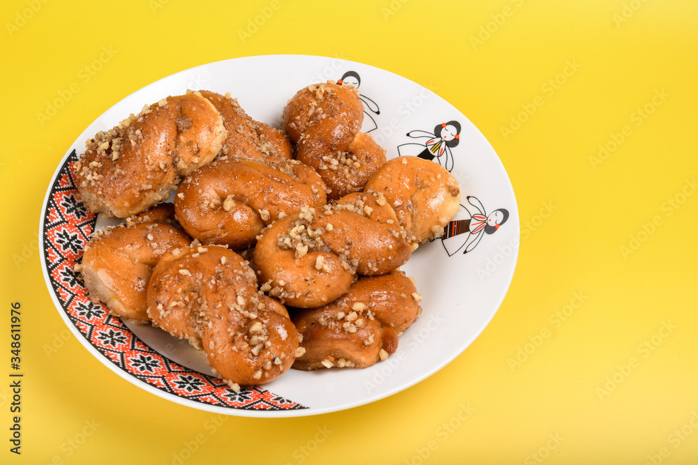 Concept of romanian cuisine. Homemade Mucenici, traditional desserts made in the figure 8 Concept of romanian cuisine. Homemade Mucenici, traditional desserts made in the figure 8