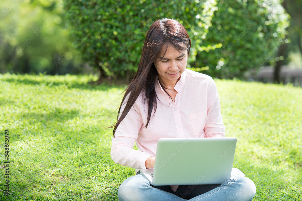 Work from home banner woman working on laptop outdoor at home cause of corona covid-19 virus world pandemic infection. Beautiful women connect internet outdoor working wireless internet technology Work from home banner woman working on laptop outdoor at home cause of corona covid-19 virus world pandemic infection. Beautiful women connect internet outdoor working wireless internet technology