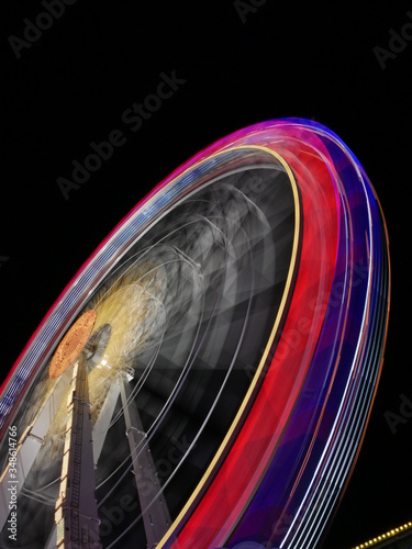 Big wheel on german Cannstatter Volksfest in Stuttgart at night
