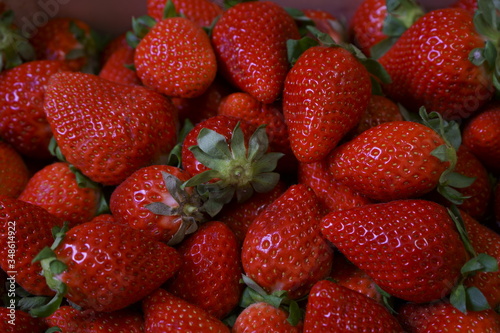 Red stunning strawberries in a box