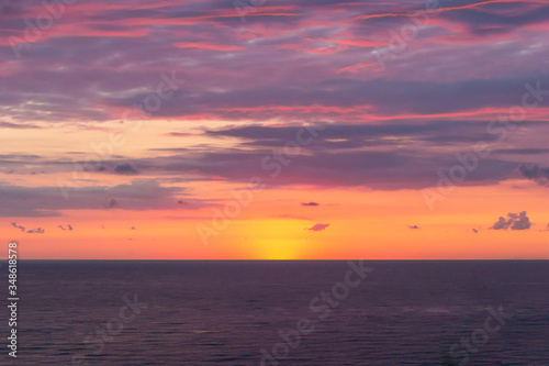 Design for postcard or calendar, place for text. The sun sets over the horizon over the Black Sea in Batumi, Adjaria, Georgia. Relaxation and meditation, the concept of peace and silence.