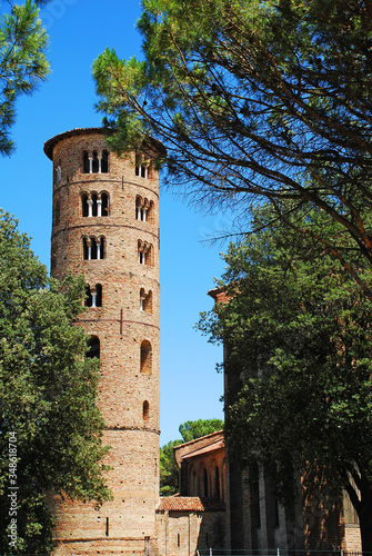 The Basilica Sant Apollinare, in Ravenna, is an important monument for Byzantine art. Here, it is seen framed by trees.
