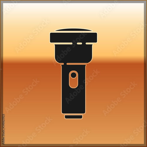 Black Flashlight icon isolated on gold background. Vector