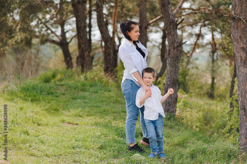 Happiness and harmony in family life. Happy family concept. Family having fun outdoor Happiness and harmony in family life. Happy family concept. Family having fun outdoor