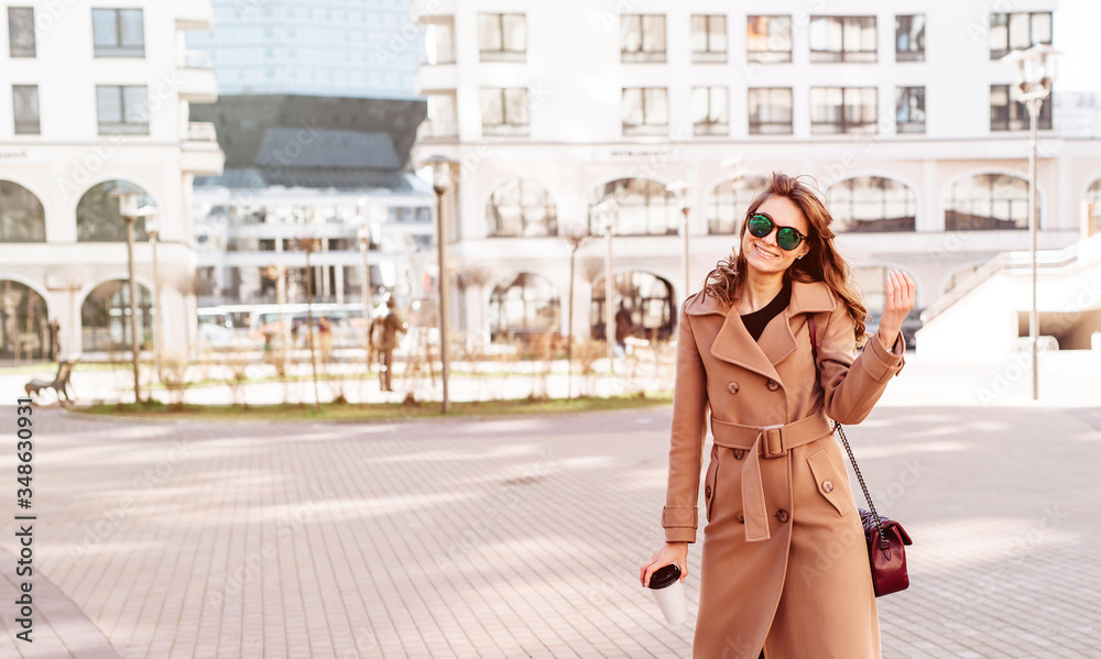 Fototapeta premium Outdoor beauty portrait of a woman, fashion model, pretty girl, street style, wearing sunglasses