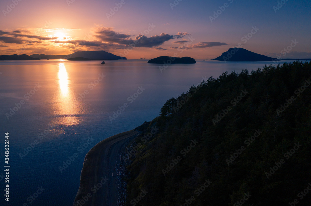 sunset over the sea with islands and mountains sunset over the sea with islands and mountains