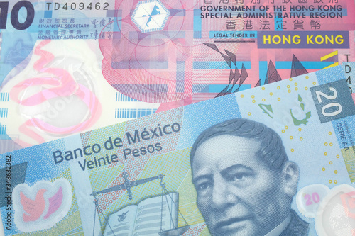Wallpaper Mural A colorful ten dollar bill from Hong Kong shot in macro with a blue, Mexican twenty peso bill Torontodigital.ca