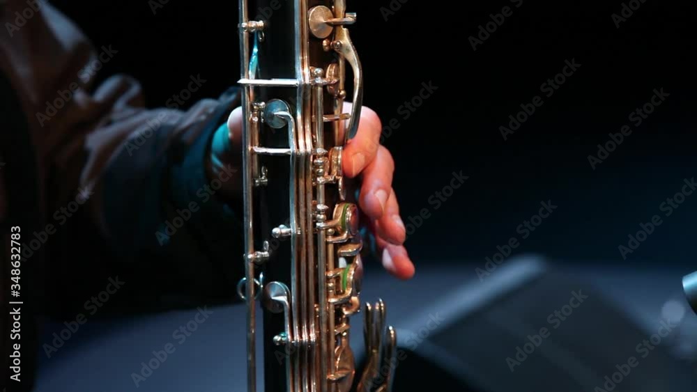 musician playing bassoon, wind instrument, slider shot musician playing bassoon, wind instrument, slider shot